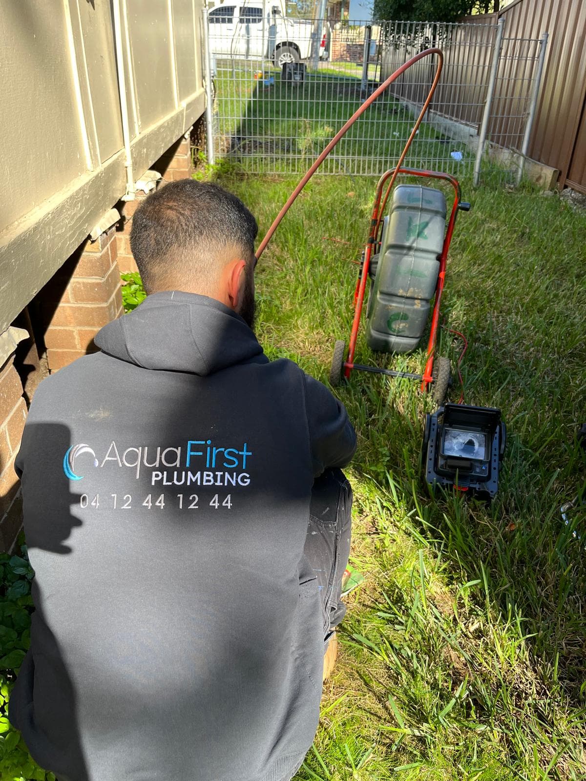 Aqua First plumber inspecting on site